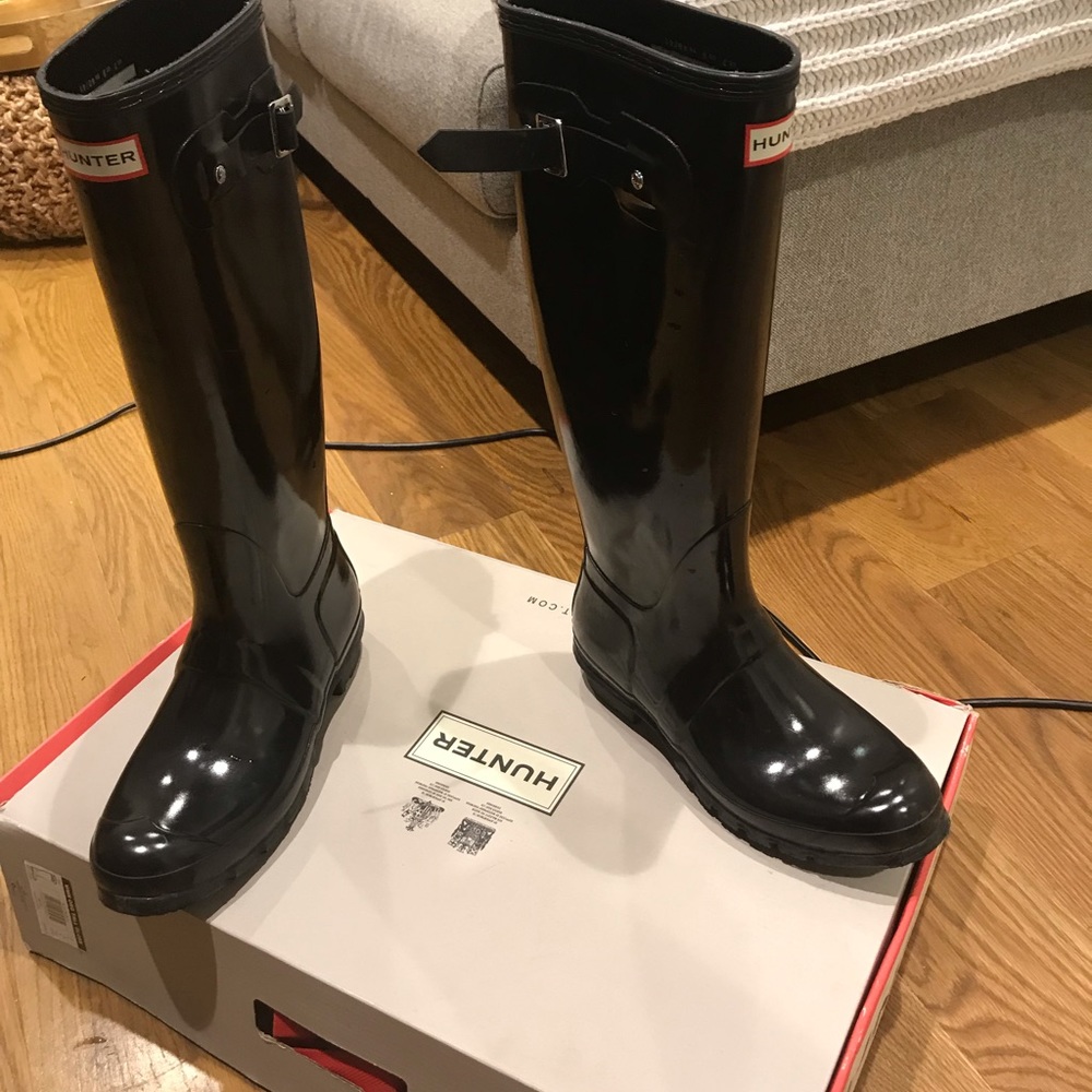 Shiny black hunter boots